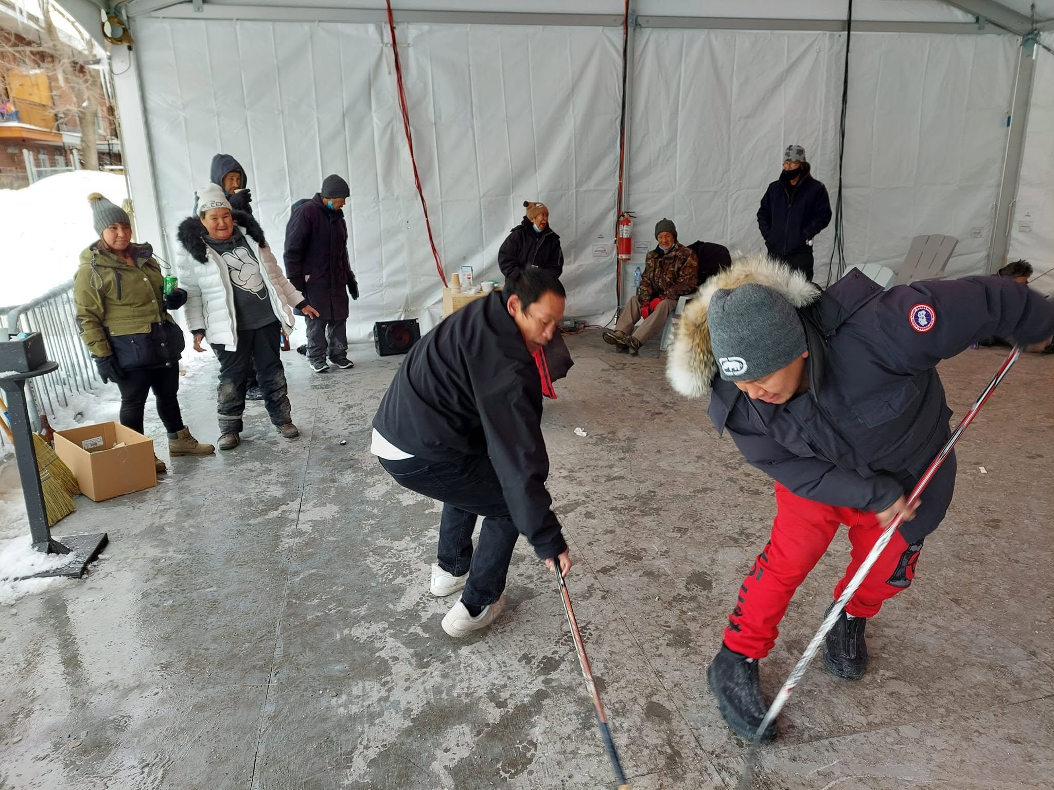 People playing hockey